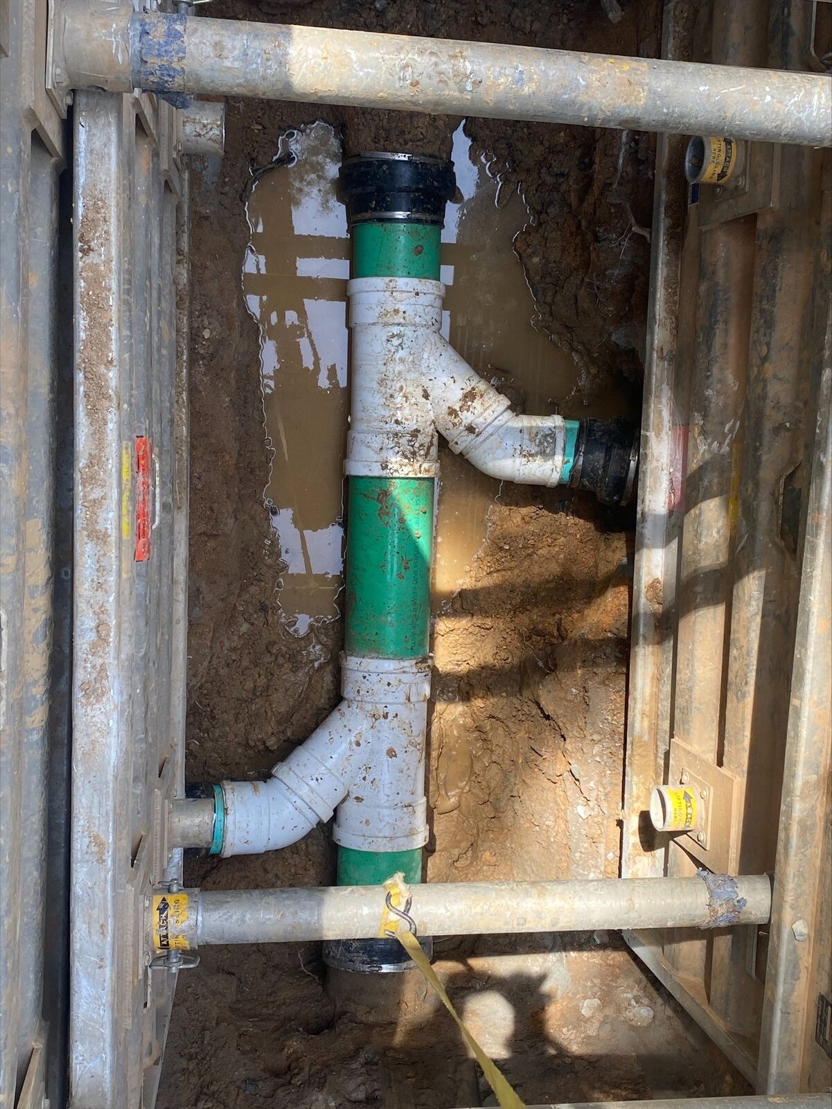 Sewer main with multiple service connections.