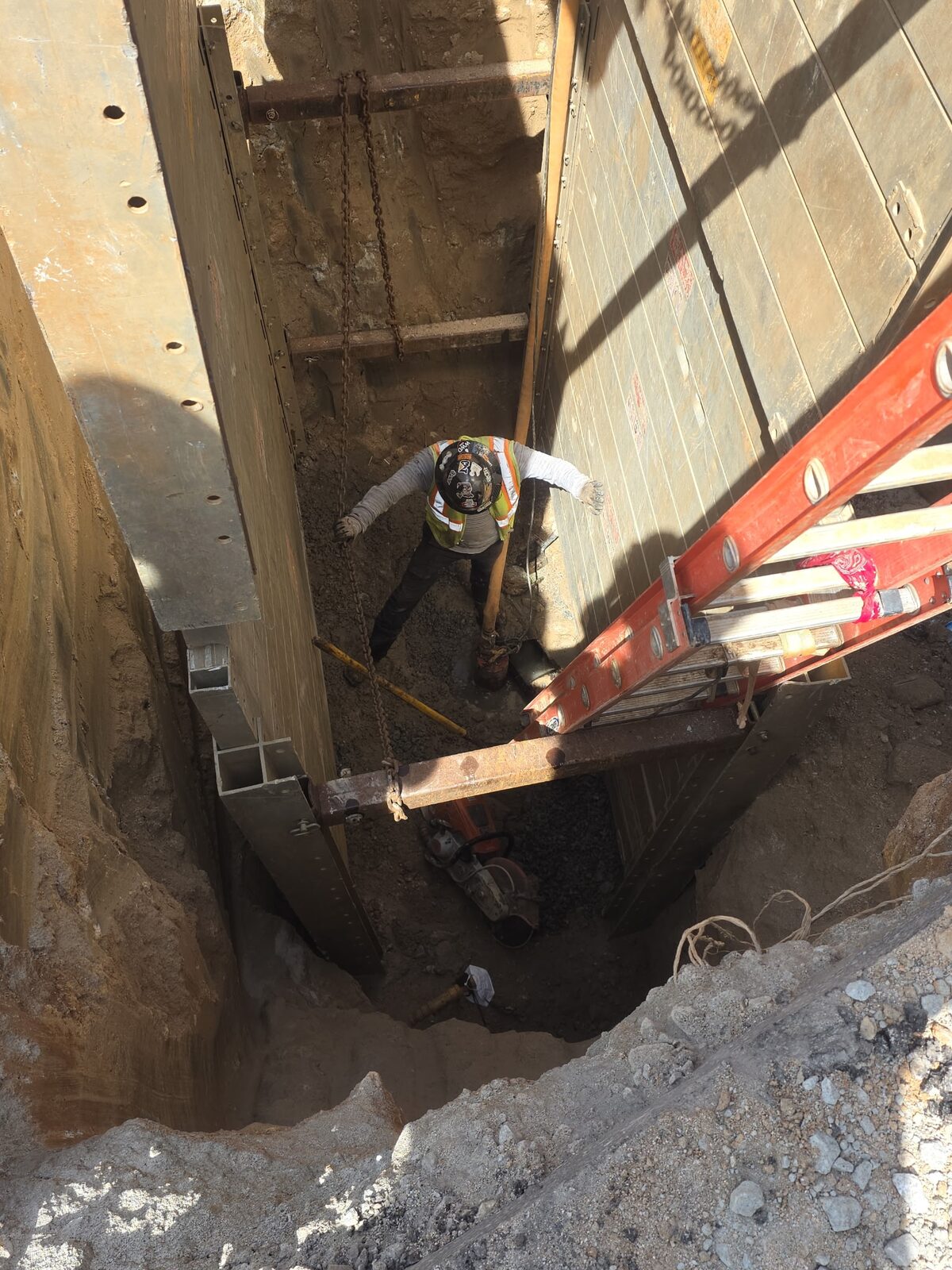 Seventeen-foot-deep sewer point repair.