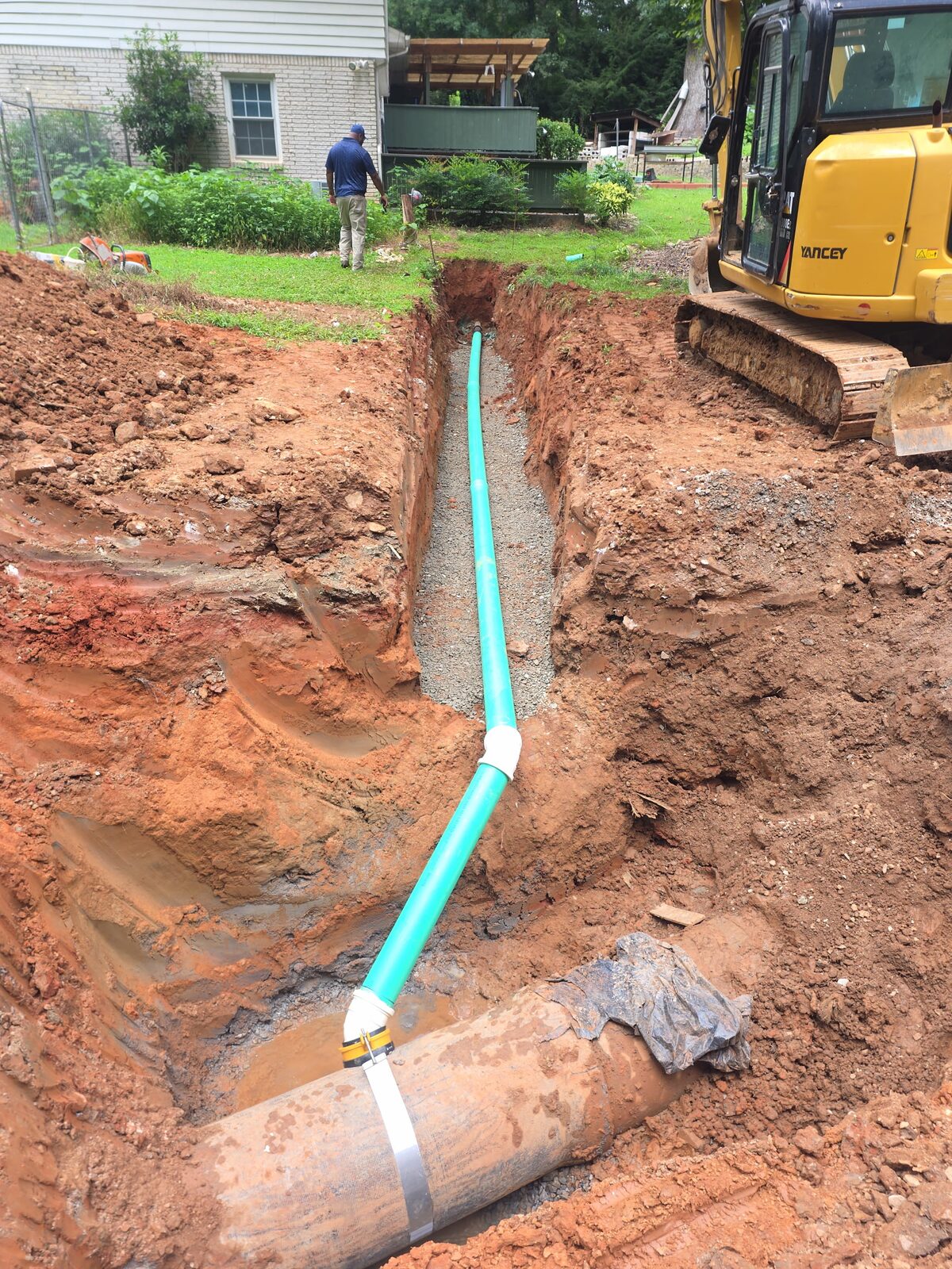 Sewer service lateral connection to main.