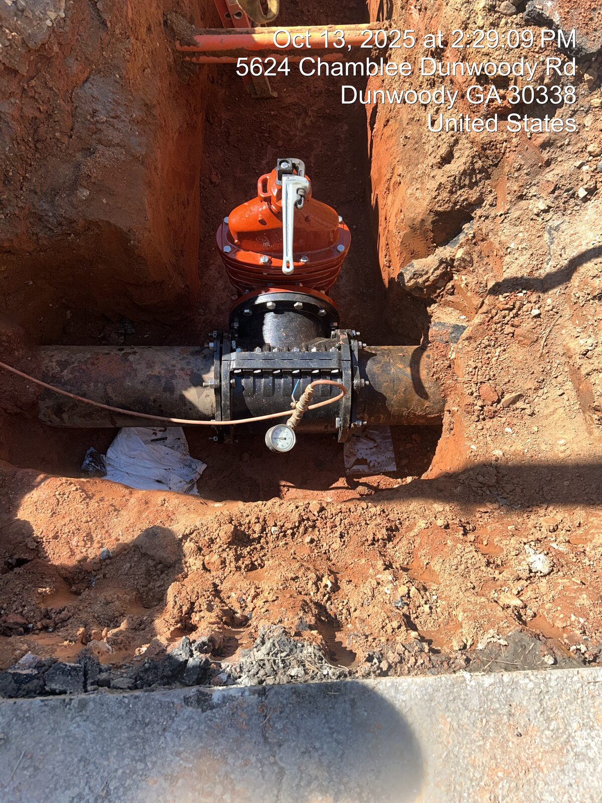 Gate valve installation on a new water main.